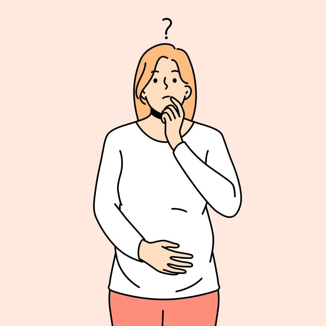Confused pregnant woman with question mark over her head - breast pump or milk collector?